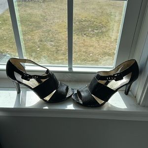 Black snake skin patent heels